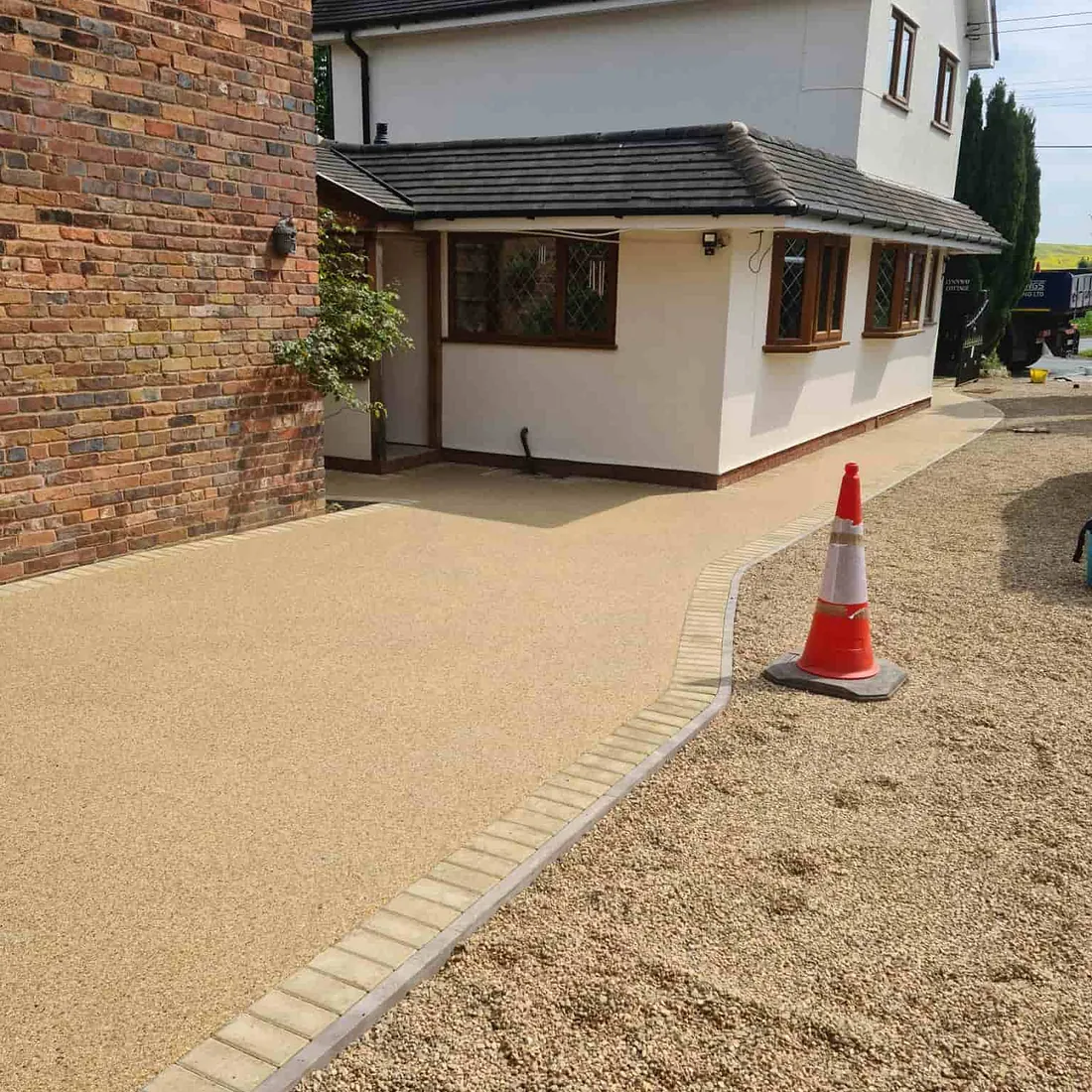 yellow tarmac driveway